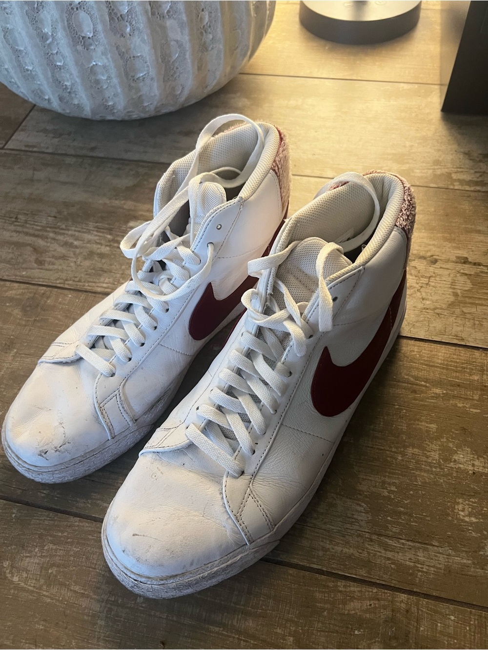 Nike White High-Top Sneakers with Red Swoosh